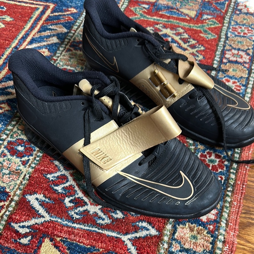Nike Black and Gold Romeleo 3